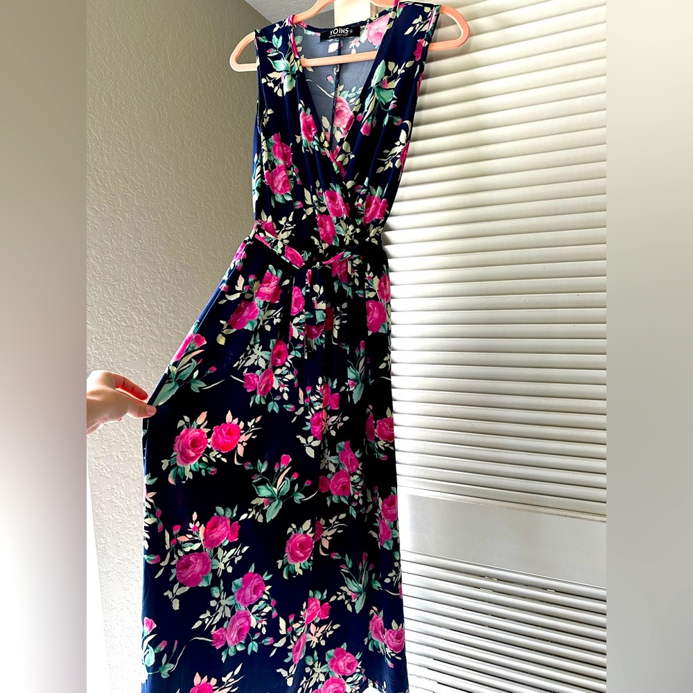 Super soft floral sundress. Dress it up or wear it casual.